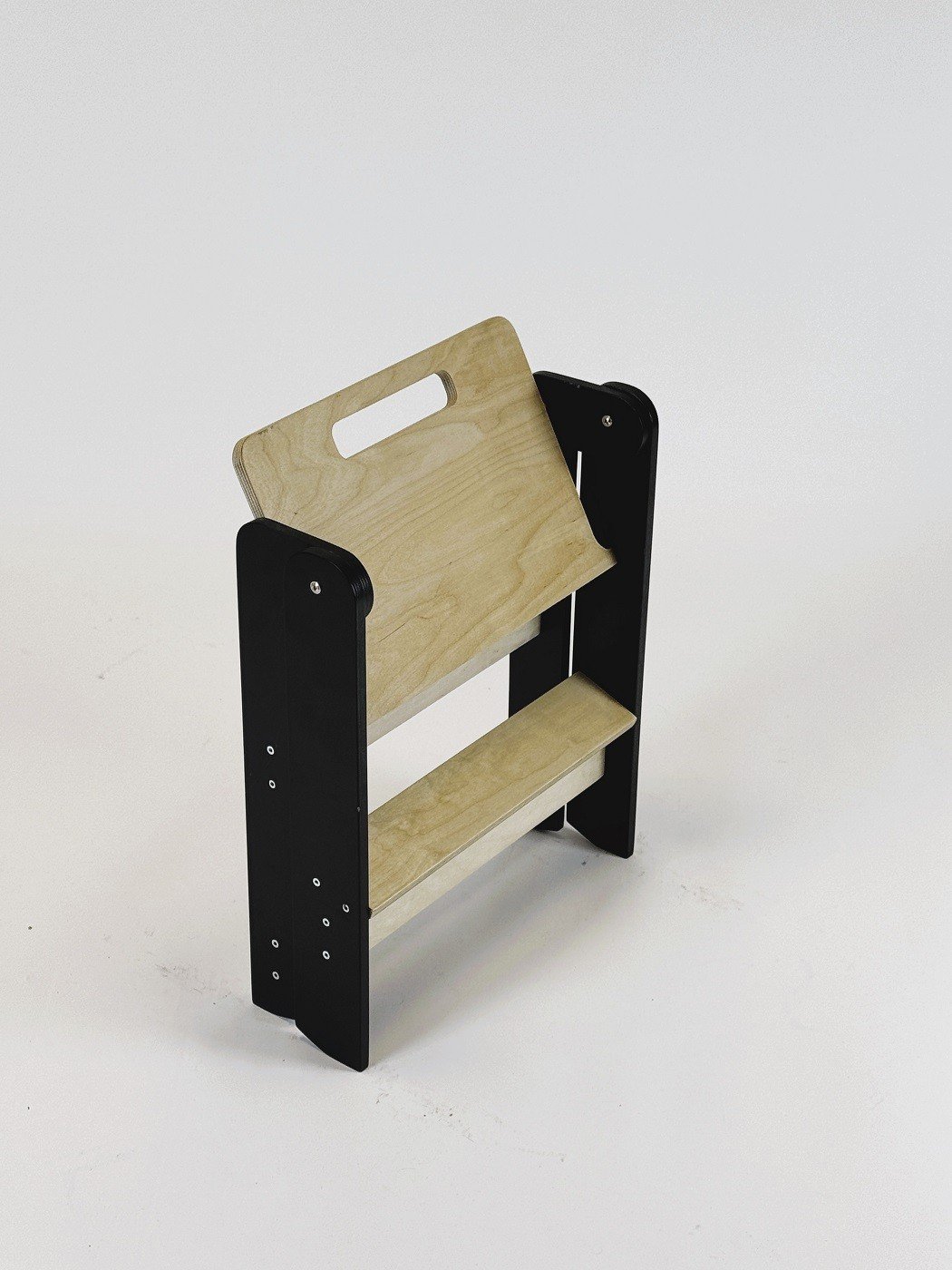 3. Folded wooden step stool with black sides and natural wood steps on white background