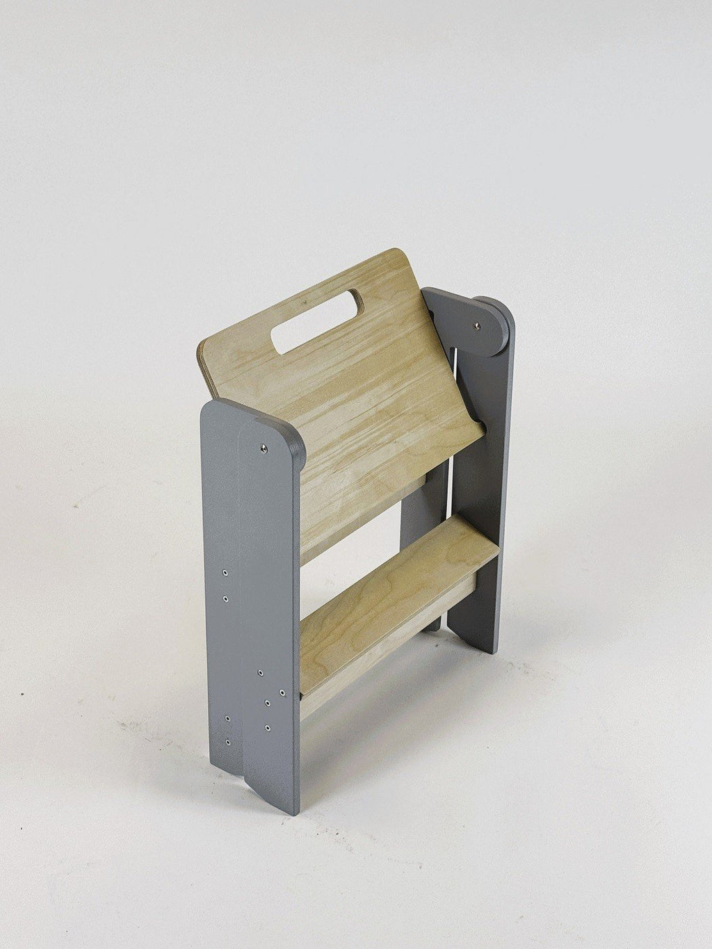 3. Folded wooden step stool with grey sides and natural wood steps on white background