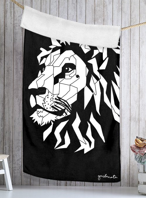 1. Garbanota Towel White Lion in black with artistic lion design, hanging in a stylish bathroom setting