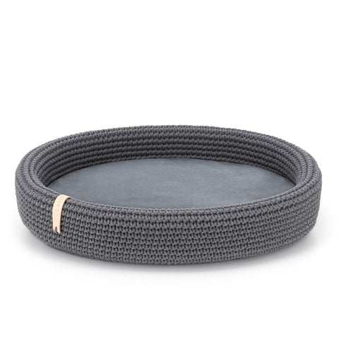 2. Studio shot of Labbvenn Lukko dog bed in anthracite, featuring oval shape and braided cotton rope design with removable cushion