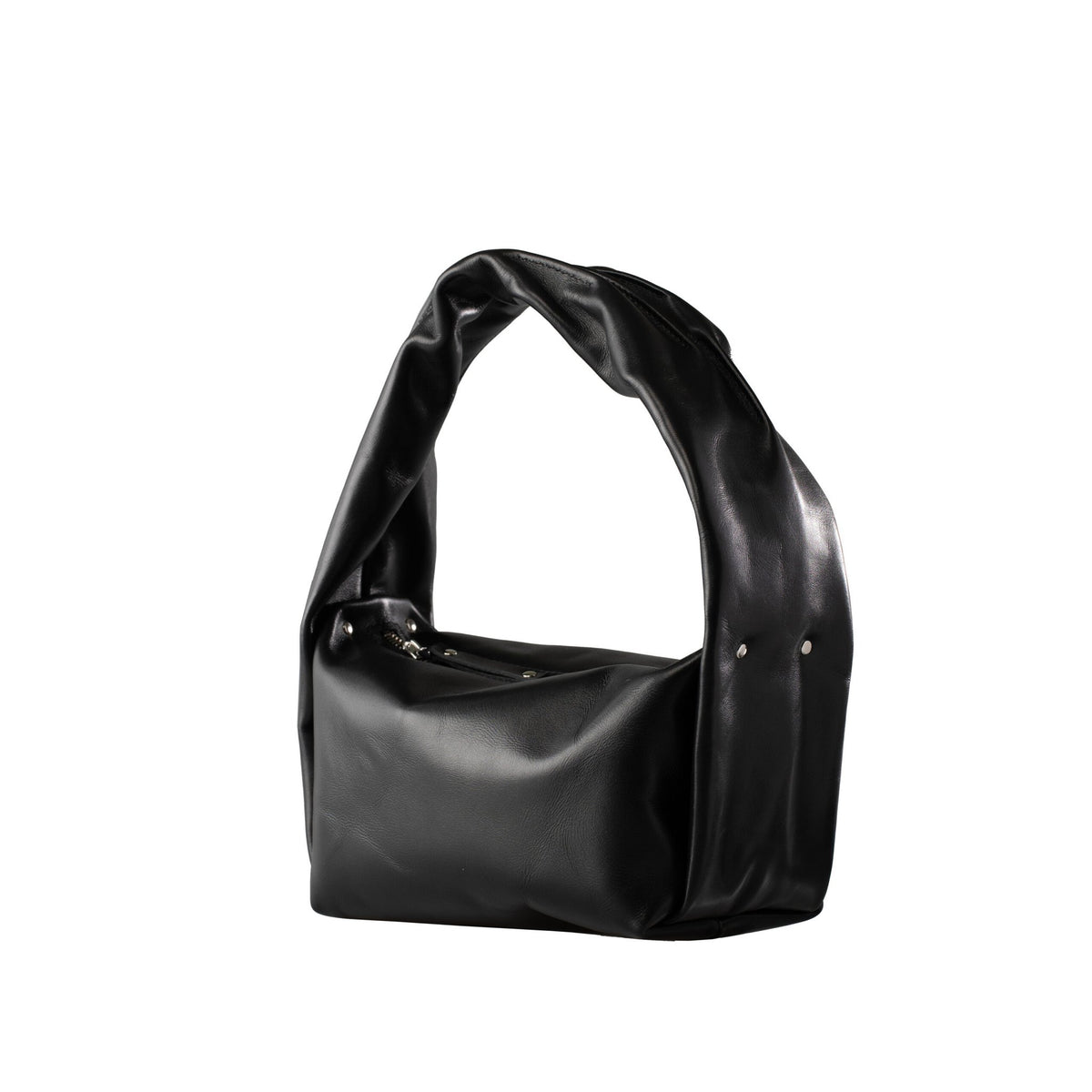 5. Studio shot of PYKOK Soft Leather Baguette Handbag Luna in black, showing wide handle and compact design