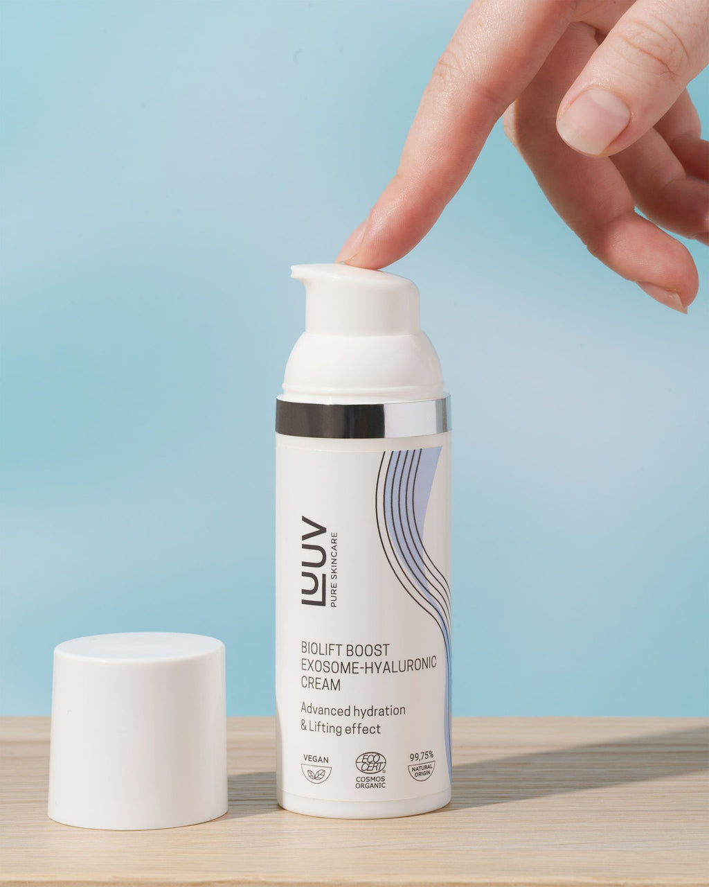 1. LUUV BioLift Exosome-Hyaluronic Cream being dispensed, showcasing advanced hydration and lifting effect, COSMOS certified