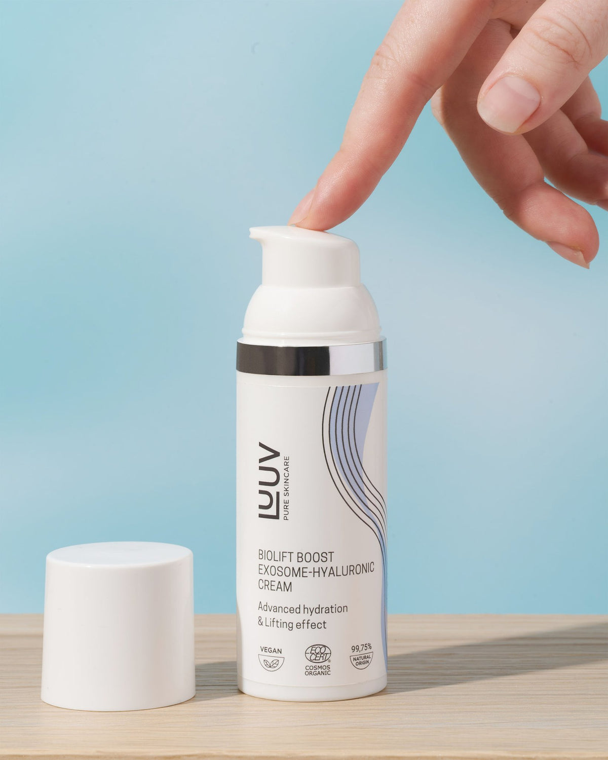 1. LUUV BioLift Exosome-Hyaluronic Cream being dispensed, showcasing advanced hydration and lifting effect, COSMOS certified