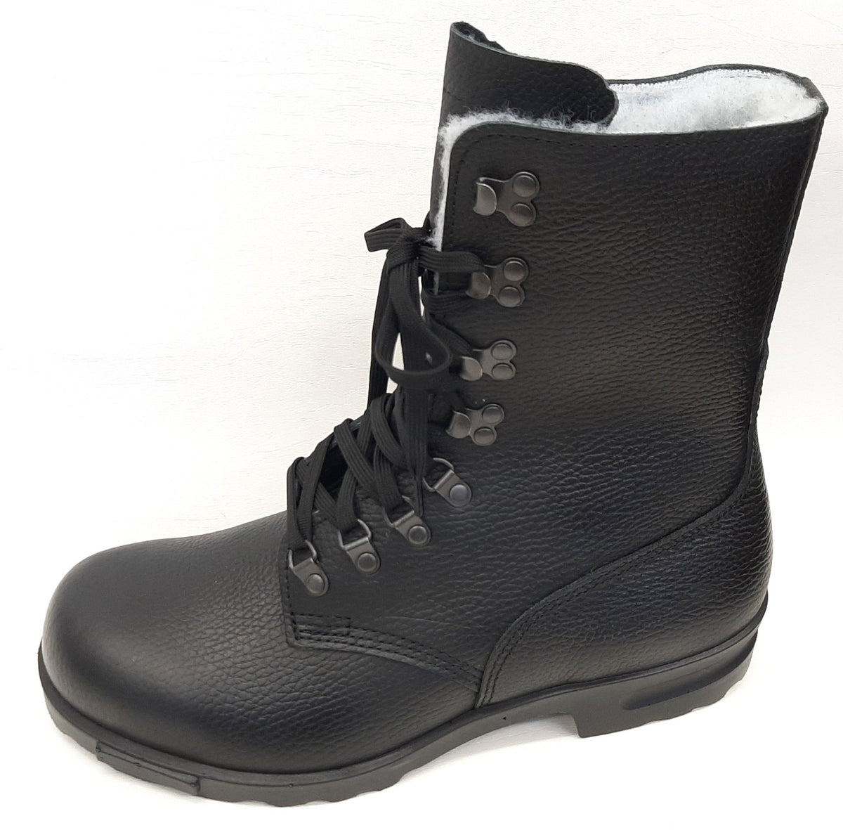 3. Side view of black M77 Norwegian combat boot with white faux fur lining on white background, highlighting lace-up detail and rugged sole