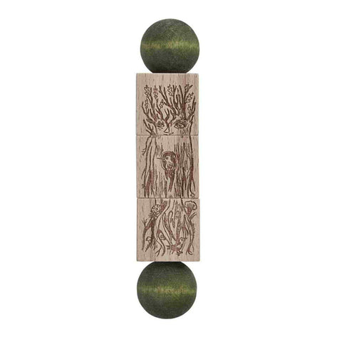 1. Magic Forest wooden spinning puzzle with engraved forest design and green ends on a white background