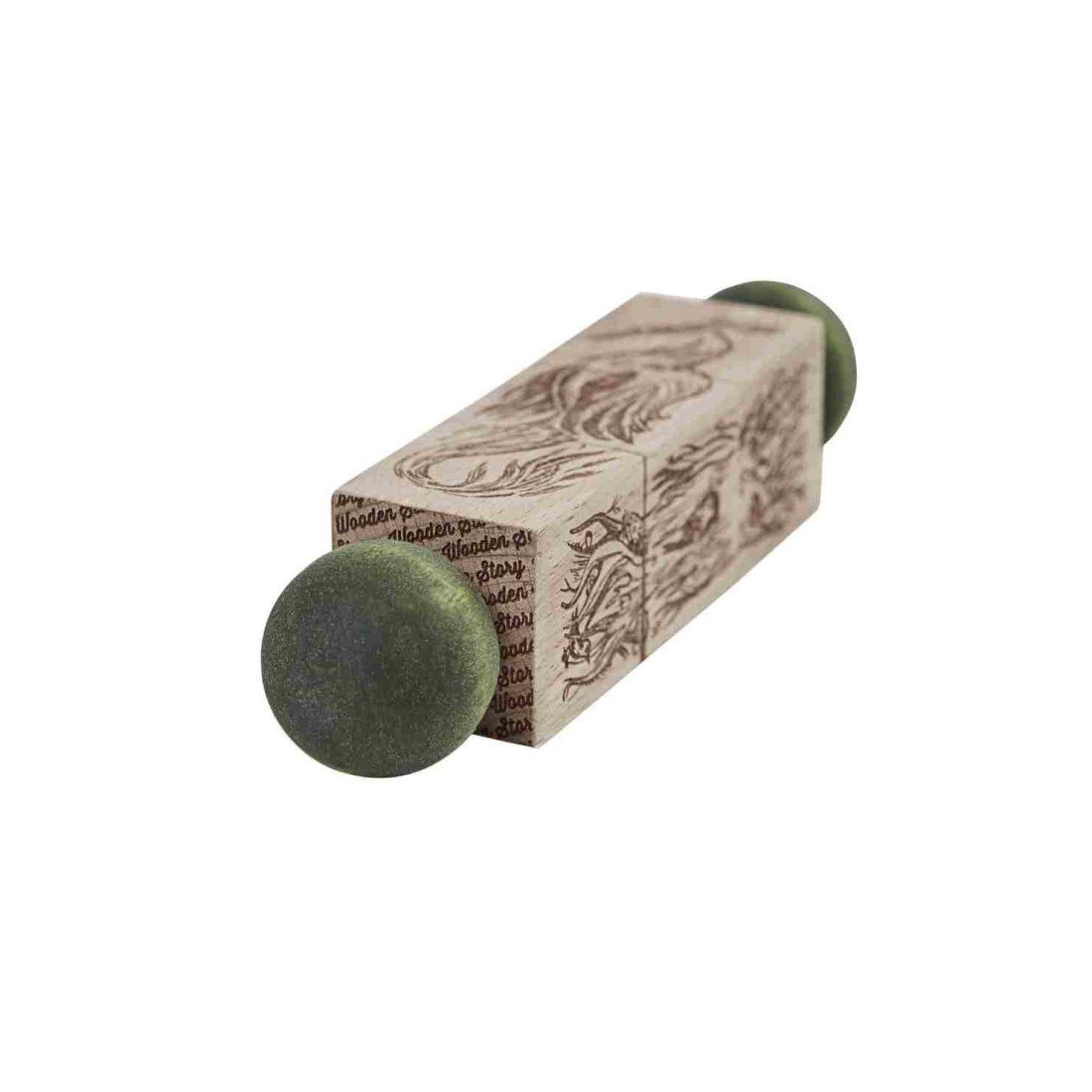 3. Close-up of Magic Forest wooden spinning puzzle showing engraved animal designs and green ends