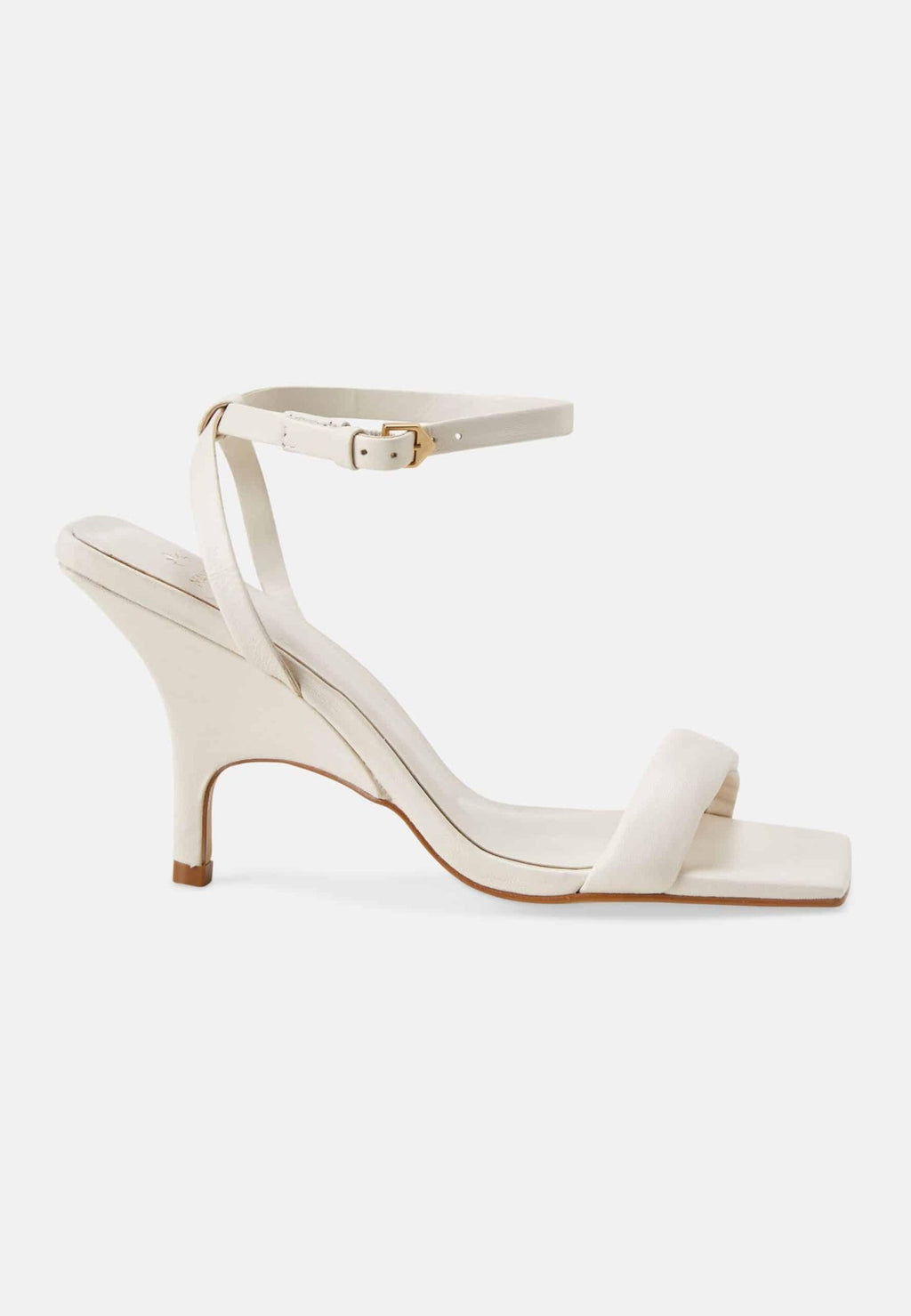 8. Studio image of Mangará Cortiça off white high heel sandal with adjustable ankle strap