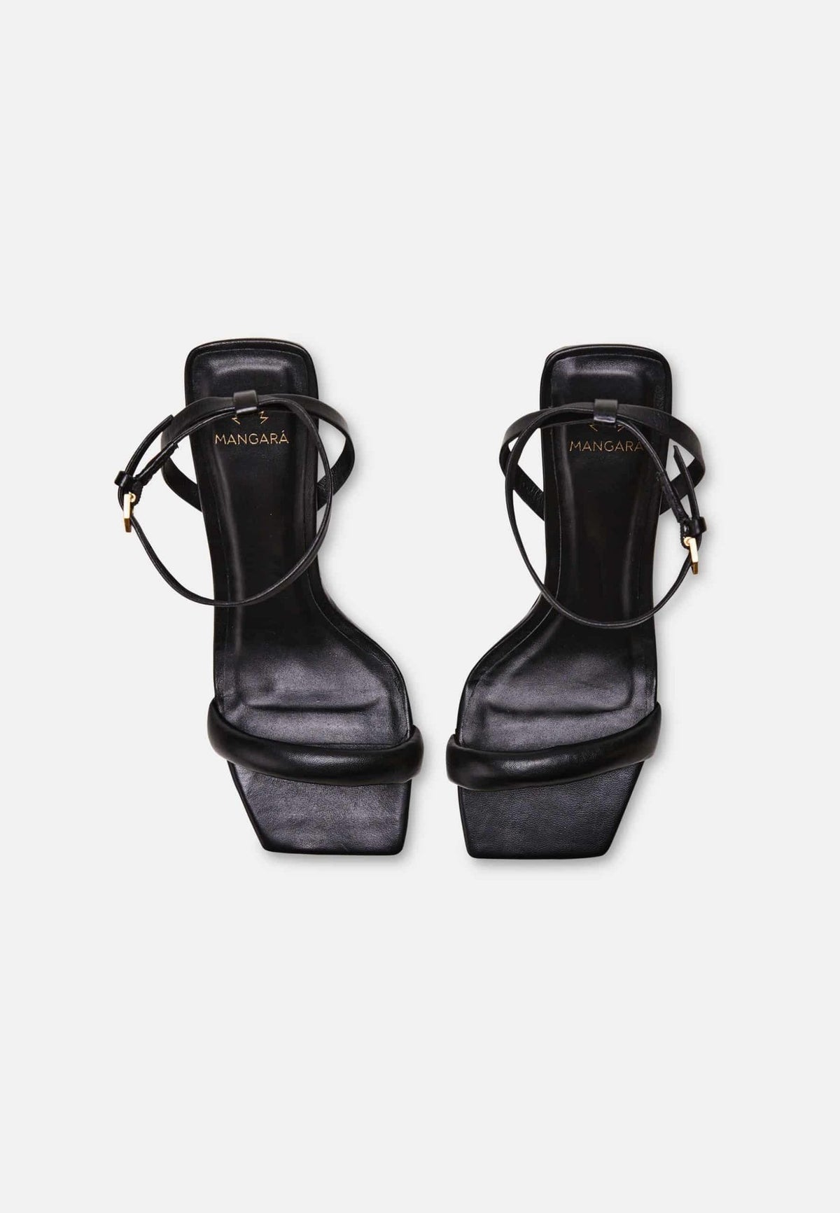 10. Top view of Mangará Cortiça black high heel sandals showing square toe and brand logo