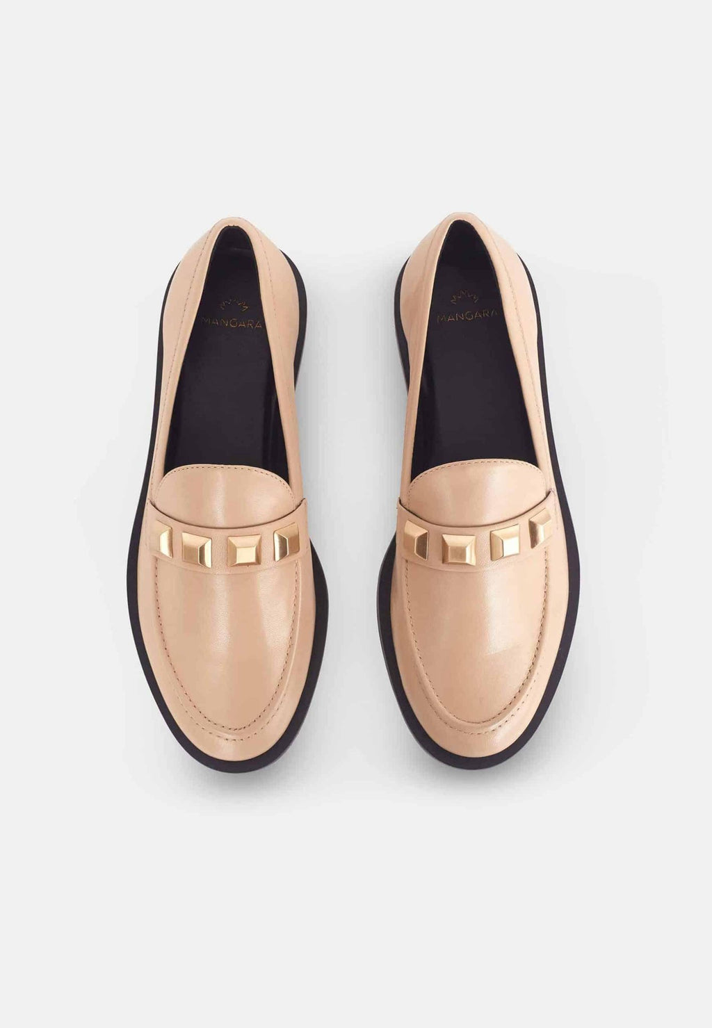 5. Studio shot of beige Mangará Caete leather loafers with metal studs, top view