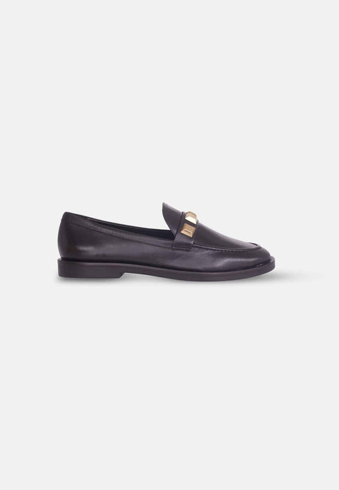 3. Women's Mangará Caete leather loafers in black, brown, and beige, displayed in a studio setting