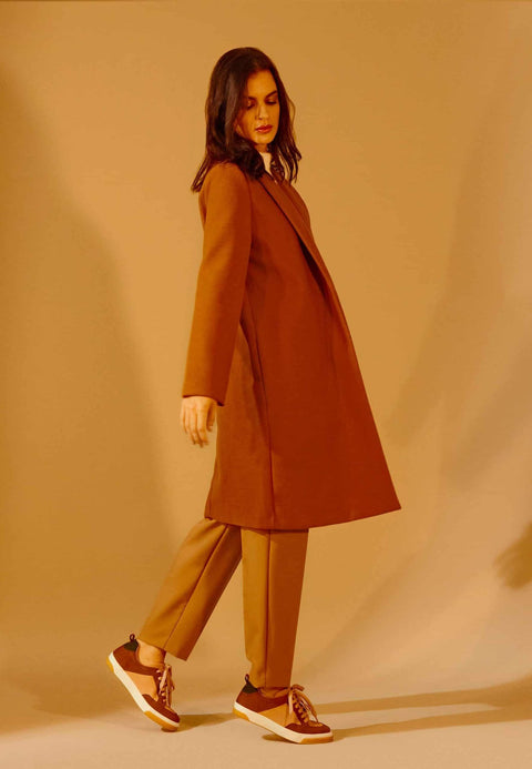 1. Women's Allamanda sneakers by Mangará in multicolored suede, worn by a model in a stylish outfit