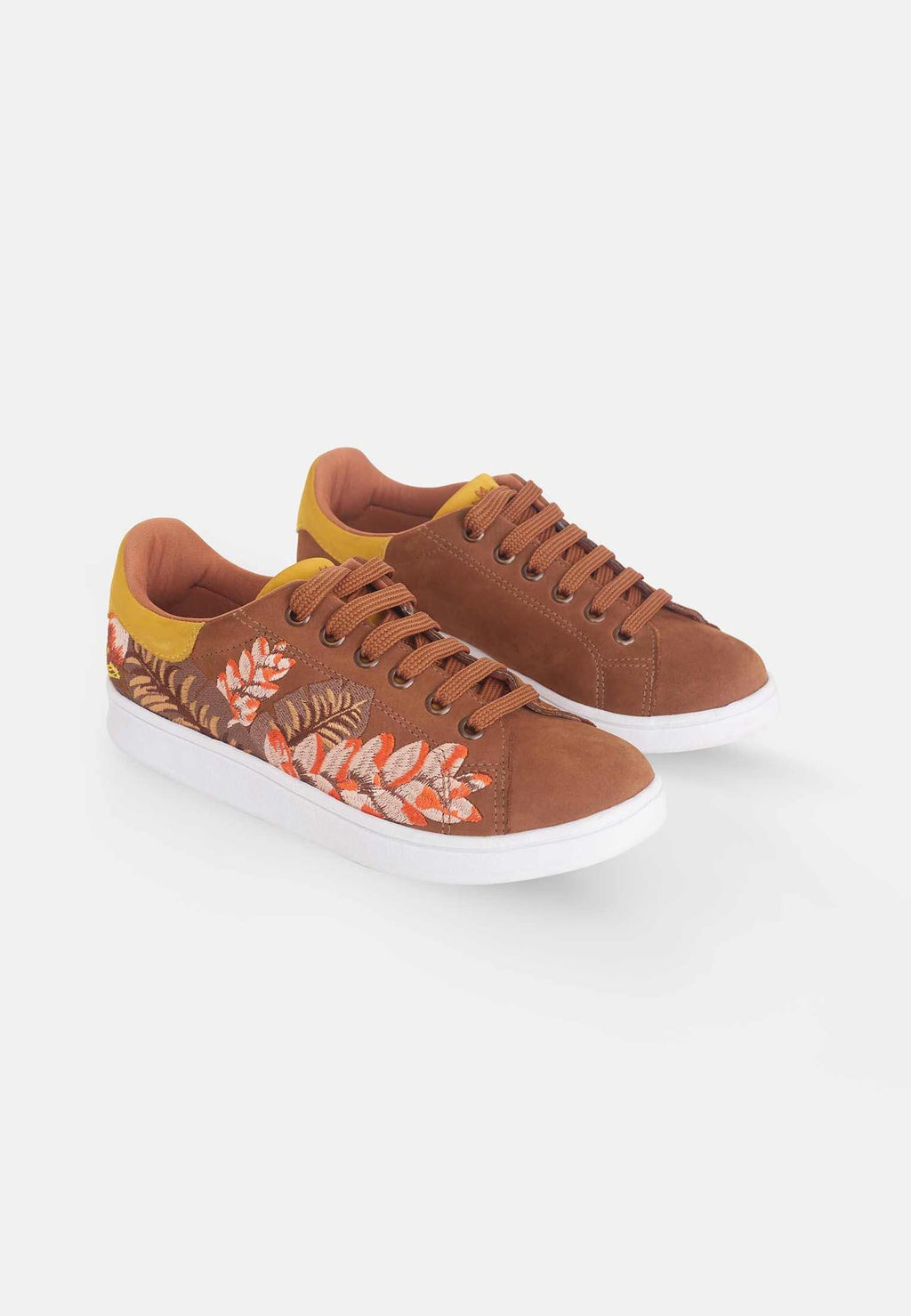 6. Studio shot of women's Mangará embroidery suede sneakers in brown, showing side view with floral design