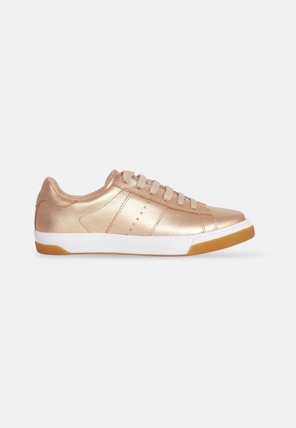 4. Side view of Mangará women's metallic golden leather sneakers with rubber outsole in studio