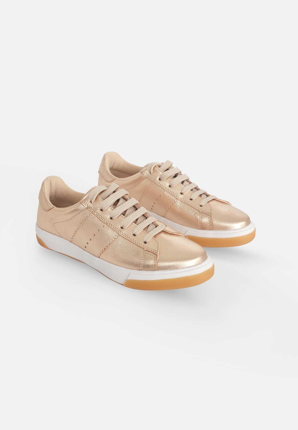 5. Pair of Mangará women's metallic golden leather sneakers with lace-up front, shown in studio