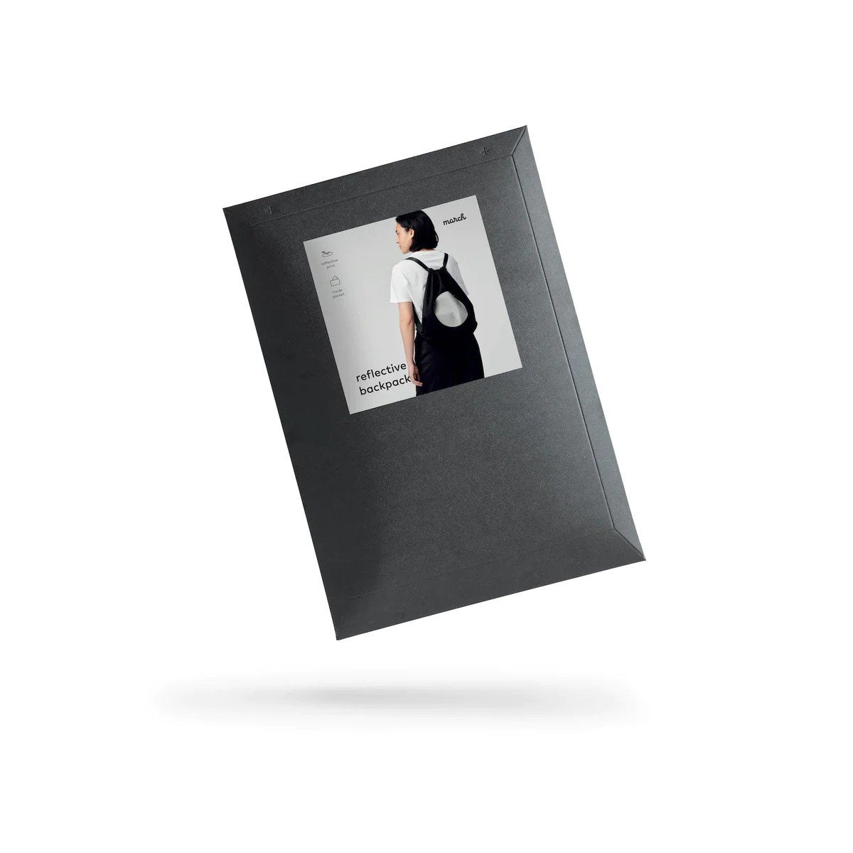 4. Packaging of March Design Studio's Water Resistant Reflective Backpack DOG, featuring product image and branding