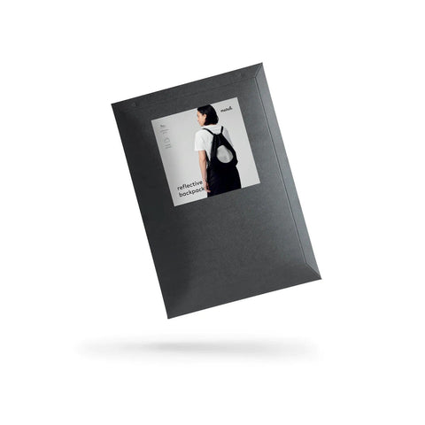 4. Packaging of March Design Studio's Water Resistant Reflective Backpack DOG, featuring product image and branding