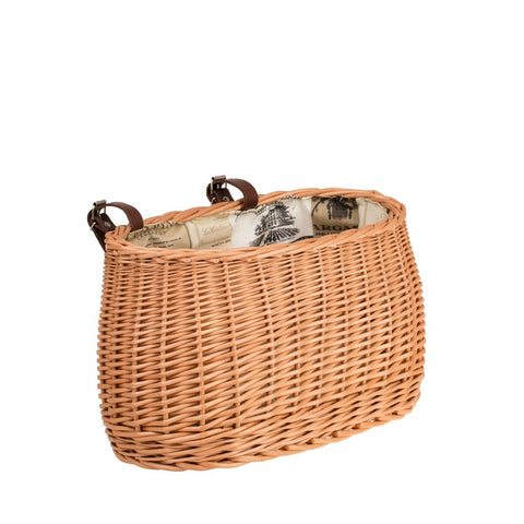 2. Studio shot of Marone wicker bike basket with beige lining and leather straps, showcasing hand-woven natural willow and elegant design by Wicker Stories