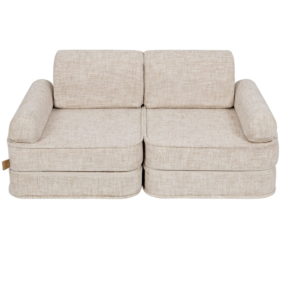 2. Beige modular children's sofa with square cushions, shown in a studio setting