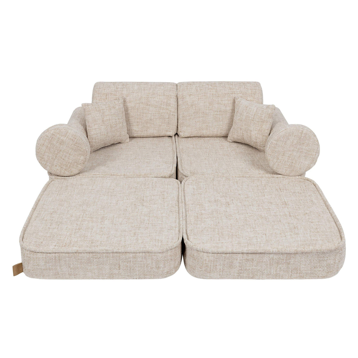 2. Beige modular children's sofa with extended cushions, shown in a studio setting