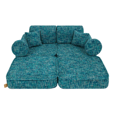 2. Medium modular sofa for kids in tangle lagoon blue with two circular cushions, shown in a studio