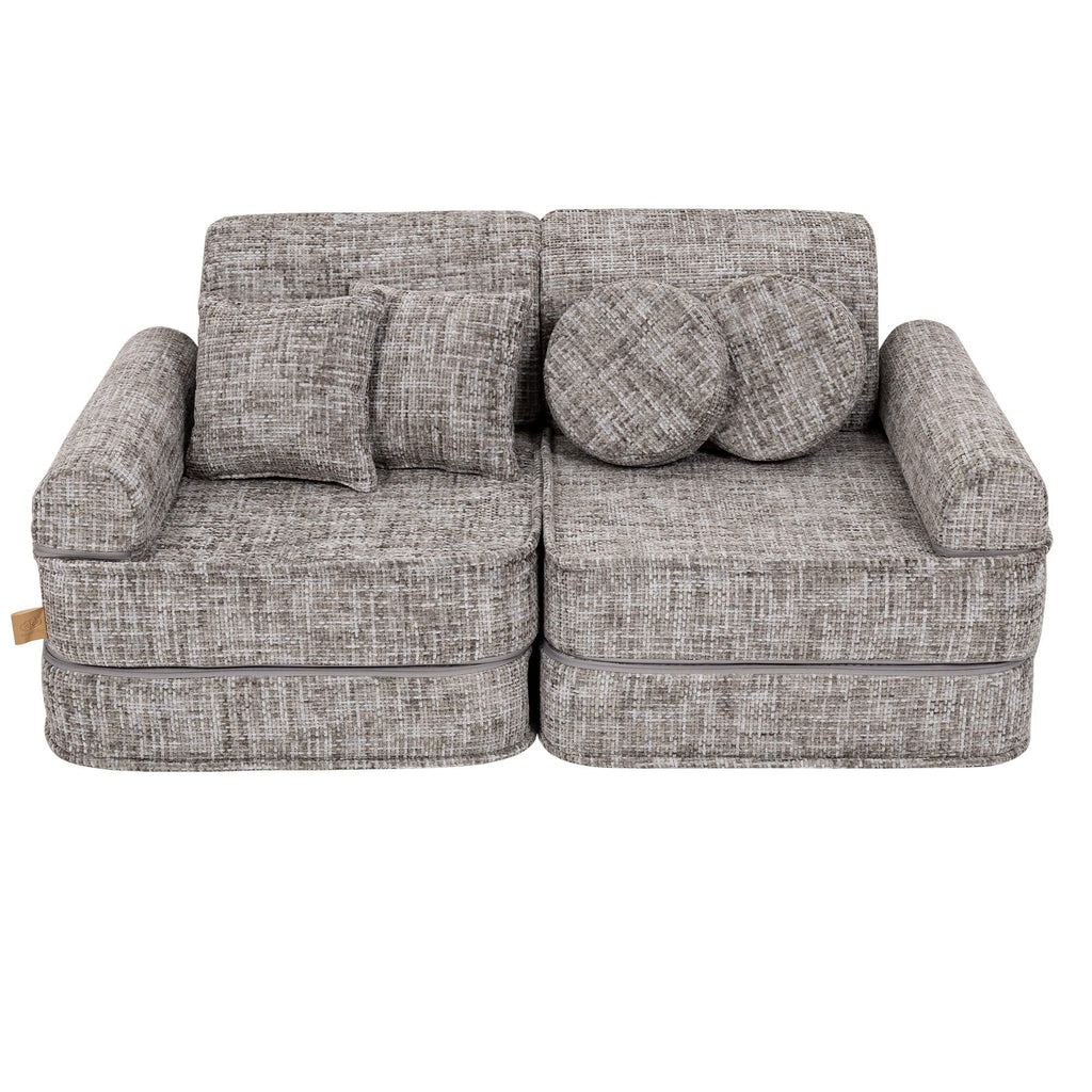 1. Medium modular sofa for kids in tangle moon grey with two round and two square cushions, shown in a studio setting