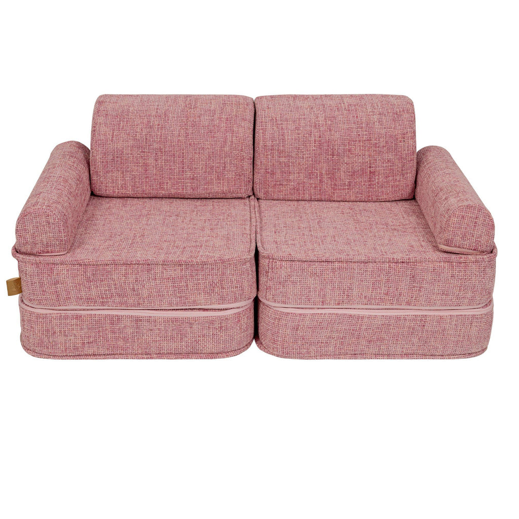 8. Medium modular sofa for kids in bubblegum pink without cushions, shown in a studio setting