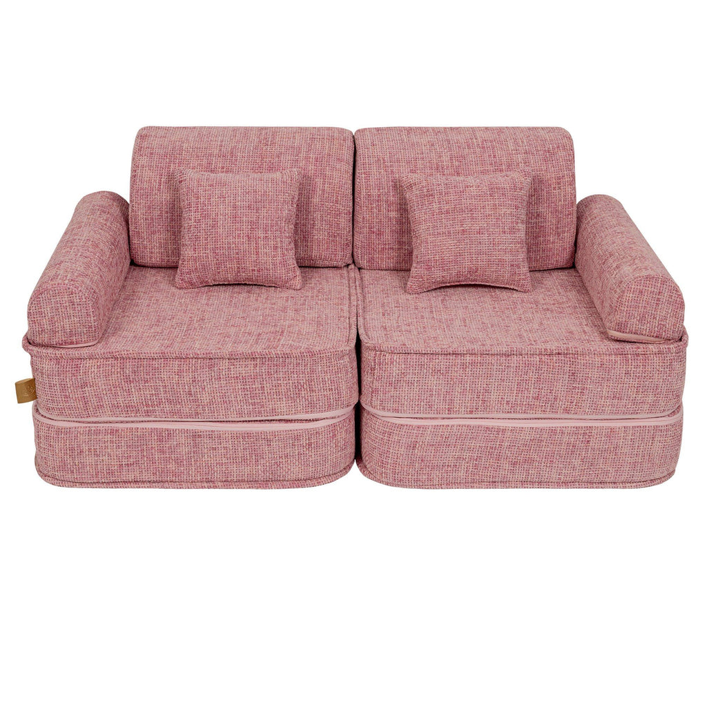 5. Medium modular sofa for kids in bubblegum pink with two square cushions, shown in a compact arrangement