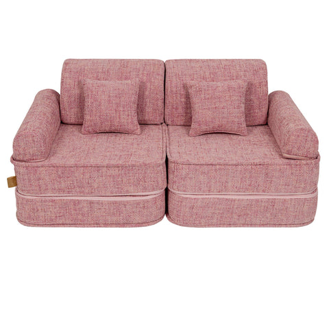 5. Medium modular sofa for kids in bubblegum pink with two square cushions, shown in a compact arrangement