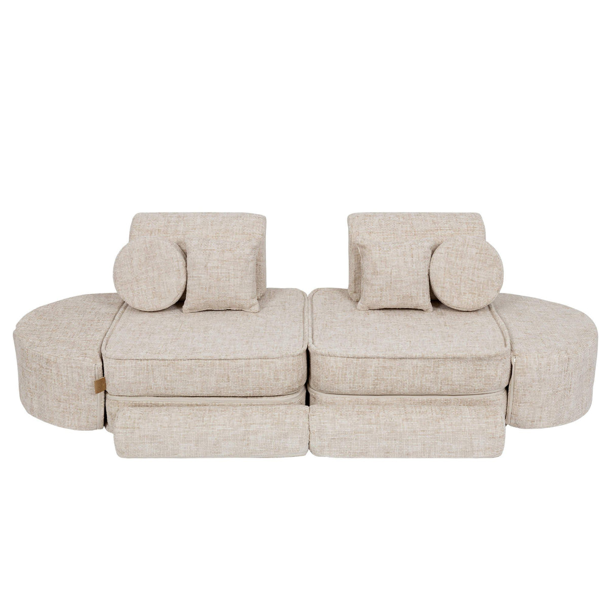 2. Beige modular children's sofa with round cushions, arranged symmetrically, on a white background
