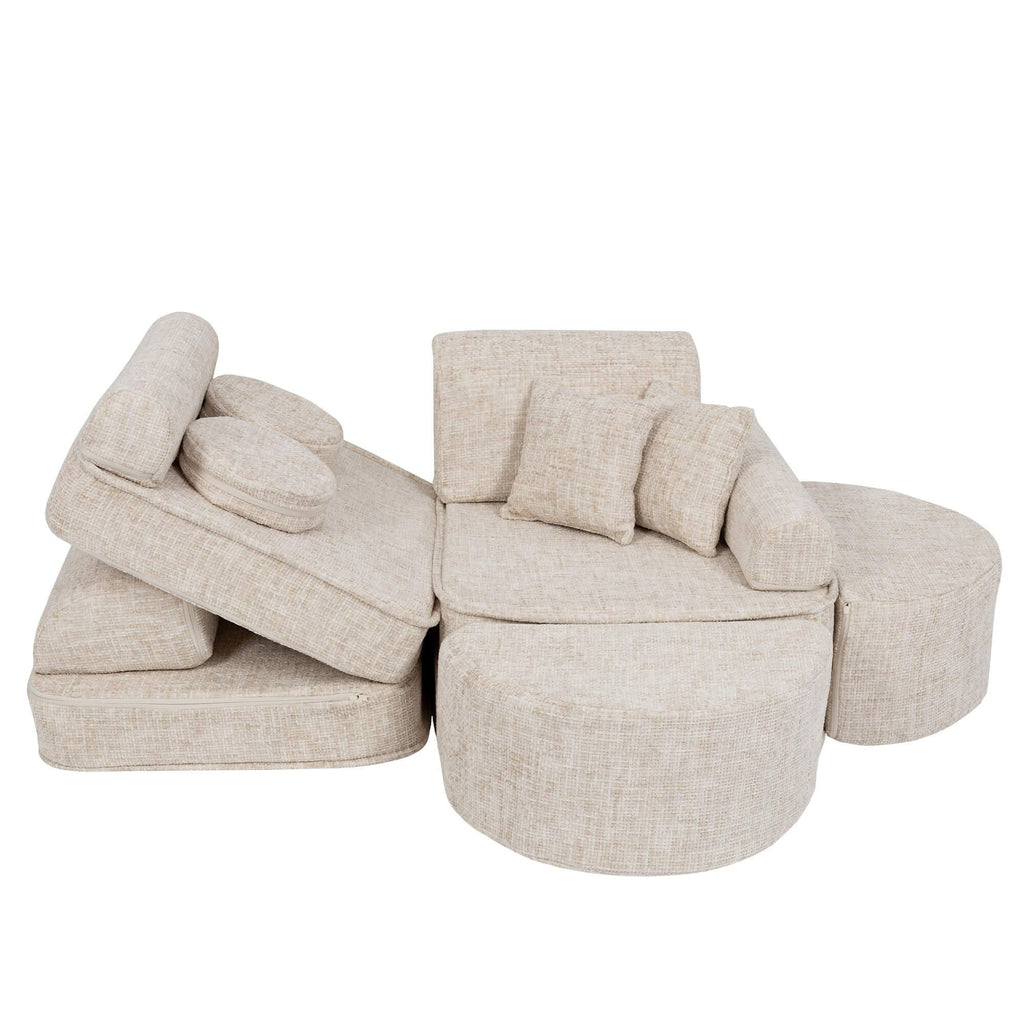 2. Beige modular children's sofa with cushions, partially disassembled to show versatility, on a white background