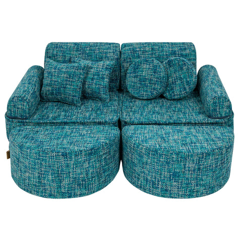 1. Children's modular sofa in lagoon blue with multiple cushions and round ottomans, arranged in a compact setup