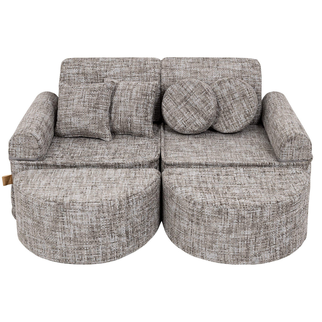 1. Grey modular children's sofa with round and square cushions arranged in a compact setup on a white background