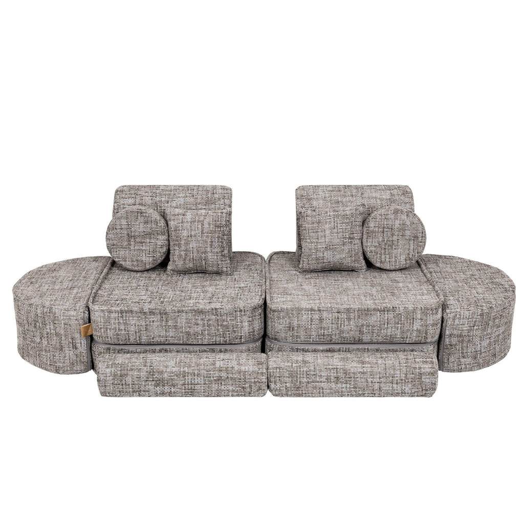 3. Grey modular children's sofa with circular and square cushions in a symmetrical layout on a white background