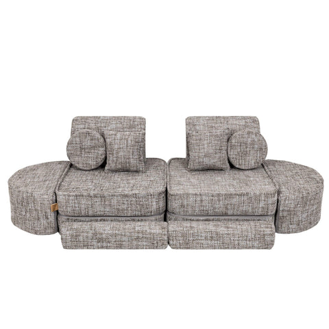 3. Grey modular children's sofa with circular and square cushions in a symmetrical layout on a white background