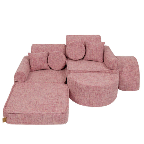 4. Pink modular children's sofa with cushions, arranged in a lounging position on a white background
