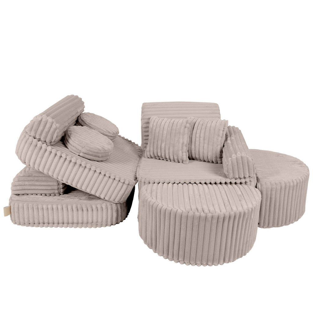 11. Beige modular kids sofa with ribbed corduroy texture, arranged in a playful, dynamic layout with cushions