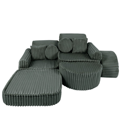 3. Medium modular kids sofa in forest green corduroy, partially extended with ribbed texture, highlighting adjustable design.