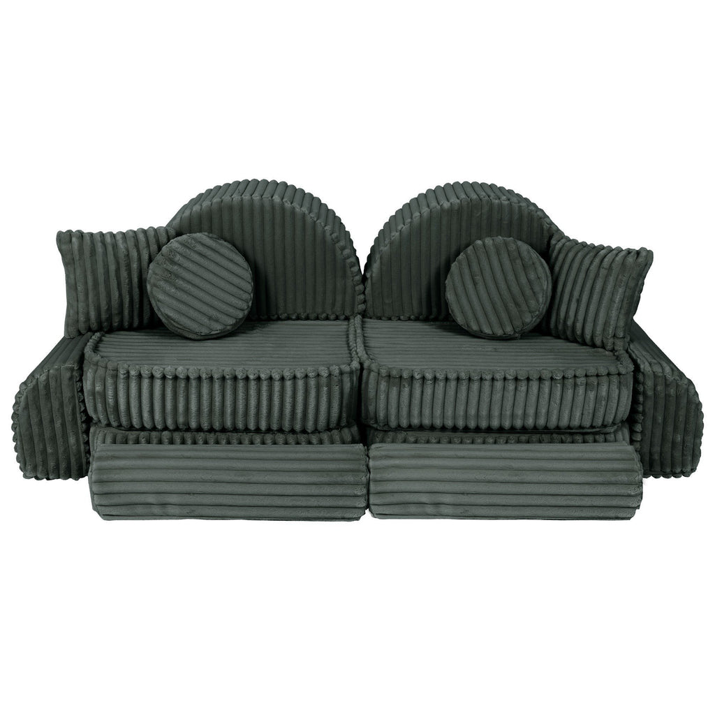 4. Medium modular kids sofa in forest green corduroy with ribbed texture, featuring two round back cushions and two square pillows.