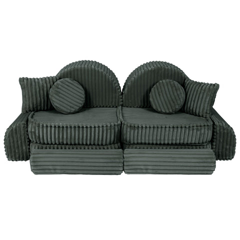 4. Medium modular kids sofa in forest green corduroy with ribbed texture, featuring two round back cushions and two square pillows.