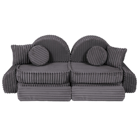 4. Grey ribbed modular kids sofa with round back cushions, arranged in a symmetrical layout