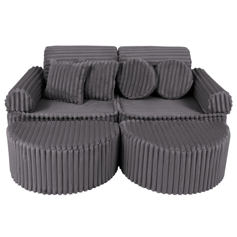 1. Modular kids sofa in grey ribbed corduroy with two back cushions and round pillows, shown in a compact configuration