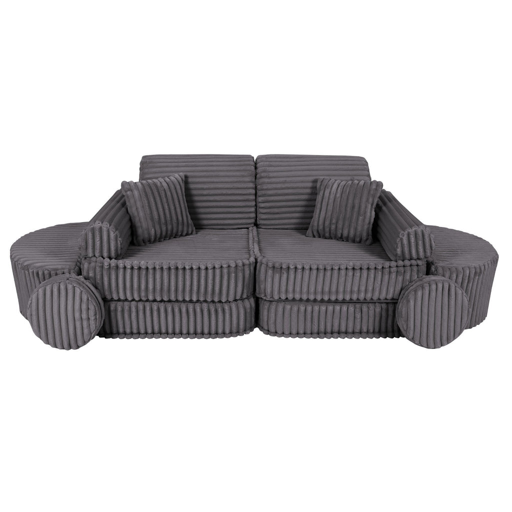 5. Grey ribbed kids sofa with two back cushions and round pillows, shown in a circular configuration