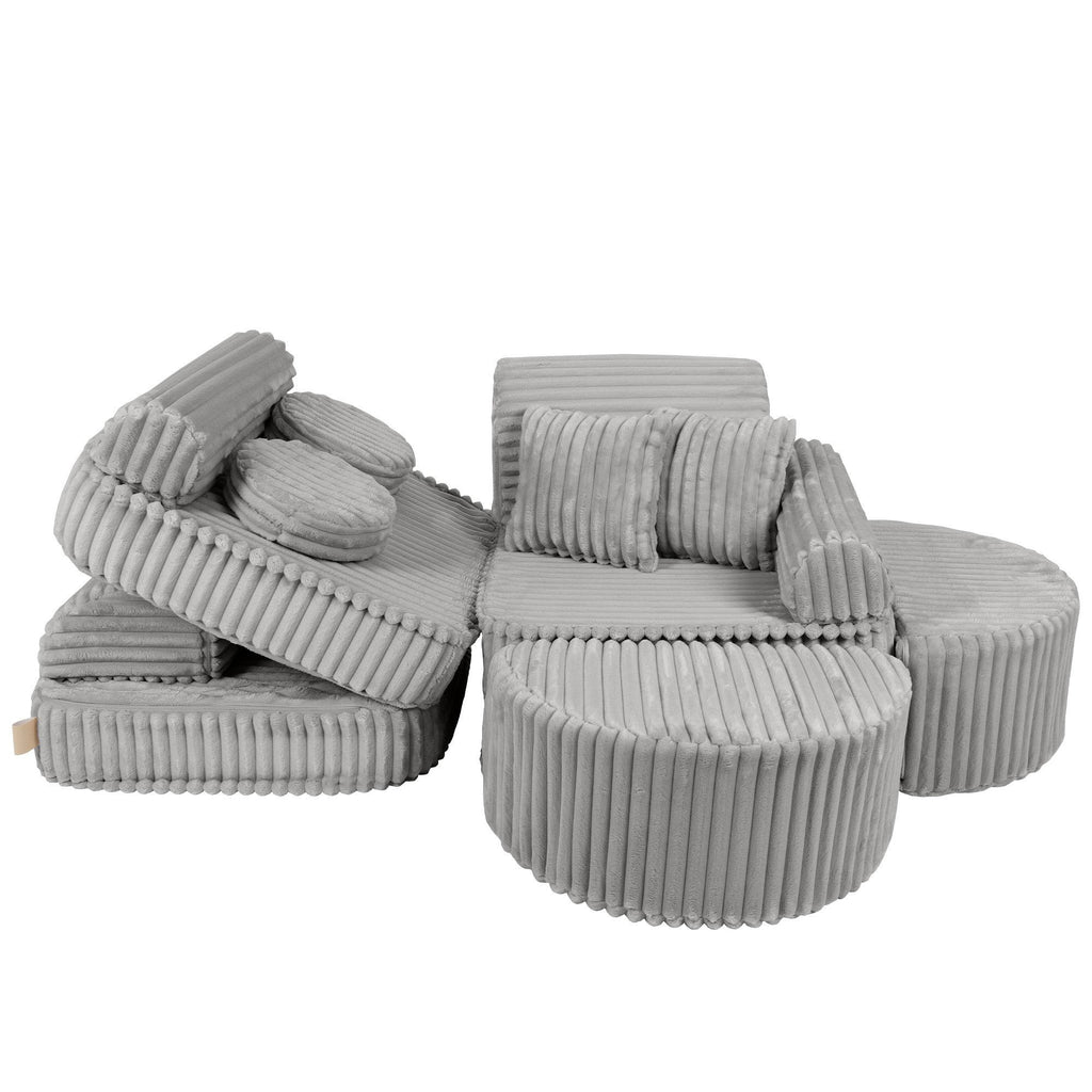 10. Adjustable kids sofa in moon grey corduroy, shown in a playful, open configuration with cushions and rounded sections