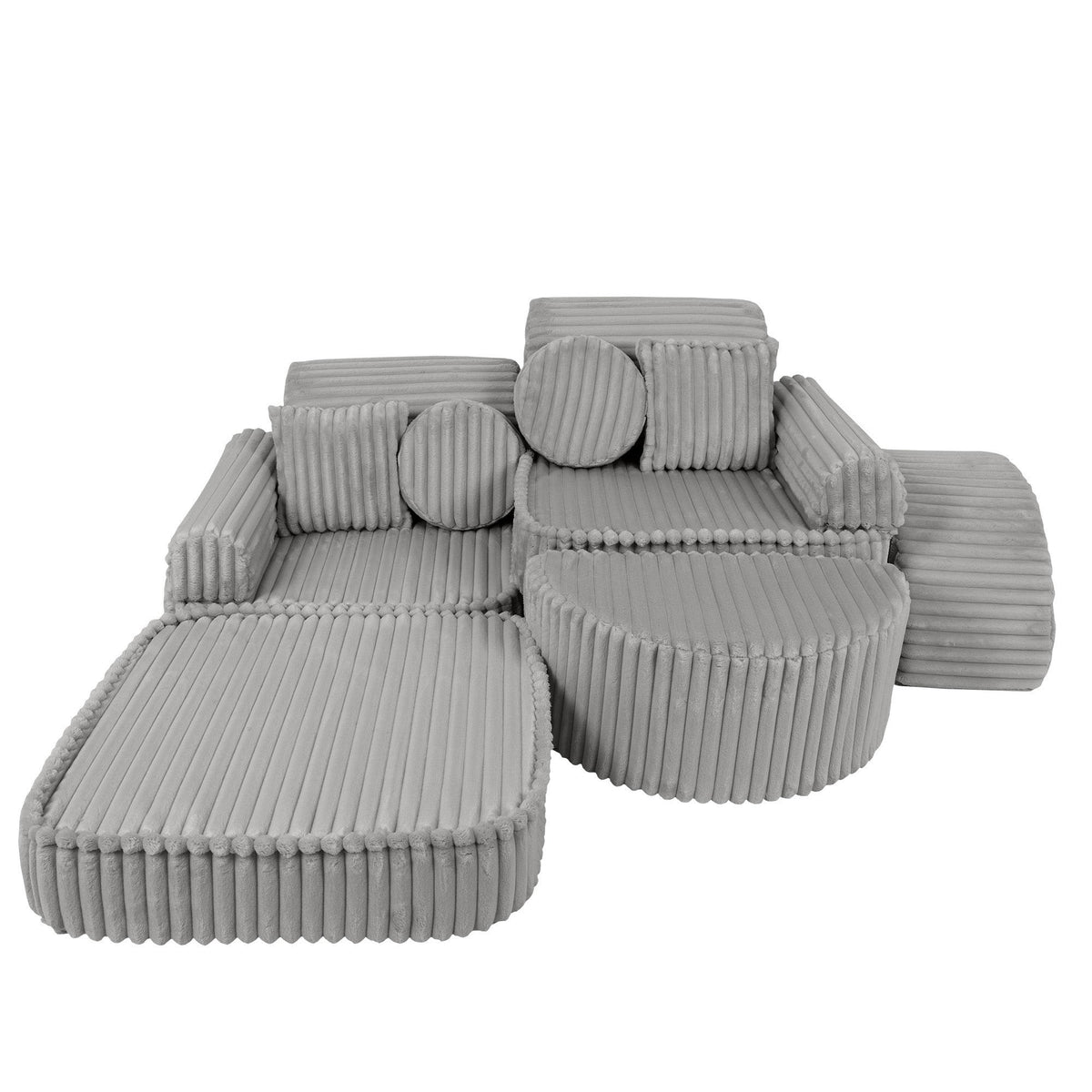 4. Adjustable kids sofa in moon grey corduroy, shown in a relaxed, open configuration with cushions and rounded sections