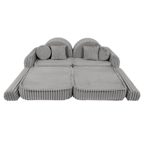 5. Moon grey modular kids sofa with ribbed texture, laid flat with cushions for a spacious seating area