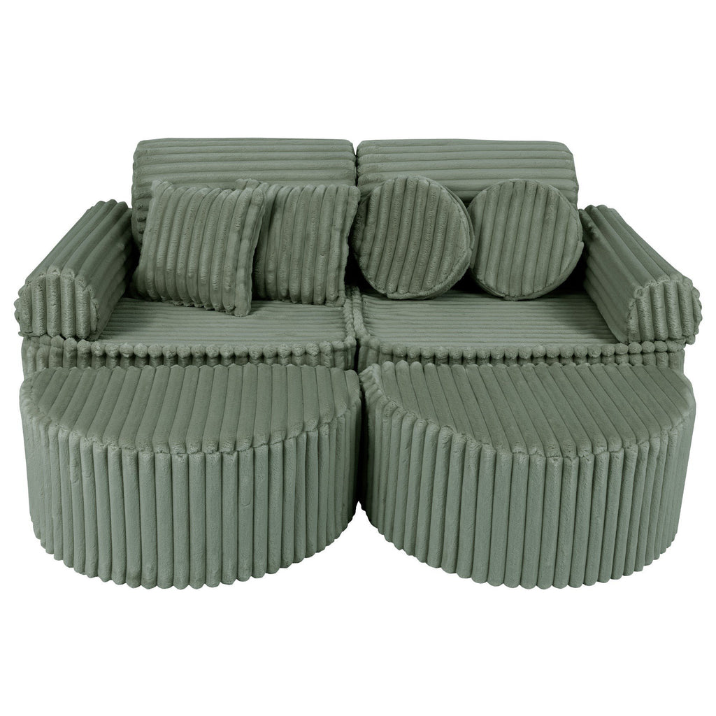 1. Medium modular kids sofa in sage green corduroy with ribbed texture, featuring two seats and multiple cushions, shown in a compact configuration.
