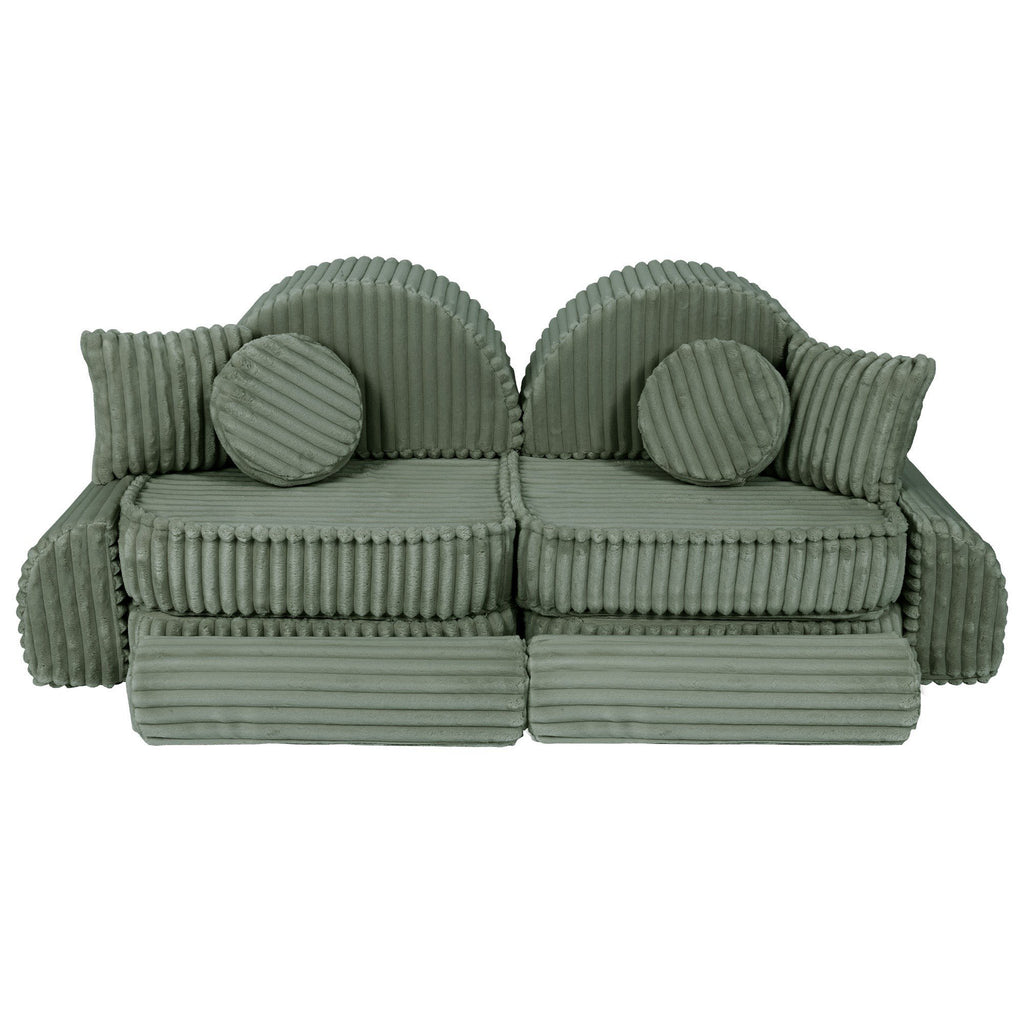 2. Medium modular kids sofa in sage green corduroy with ribbed texture, featuring two seats and circular cushions, arranged in a playful design.