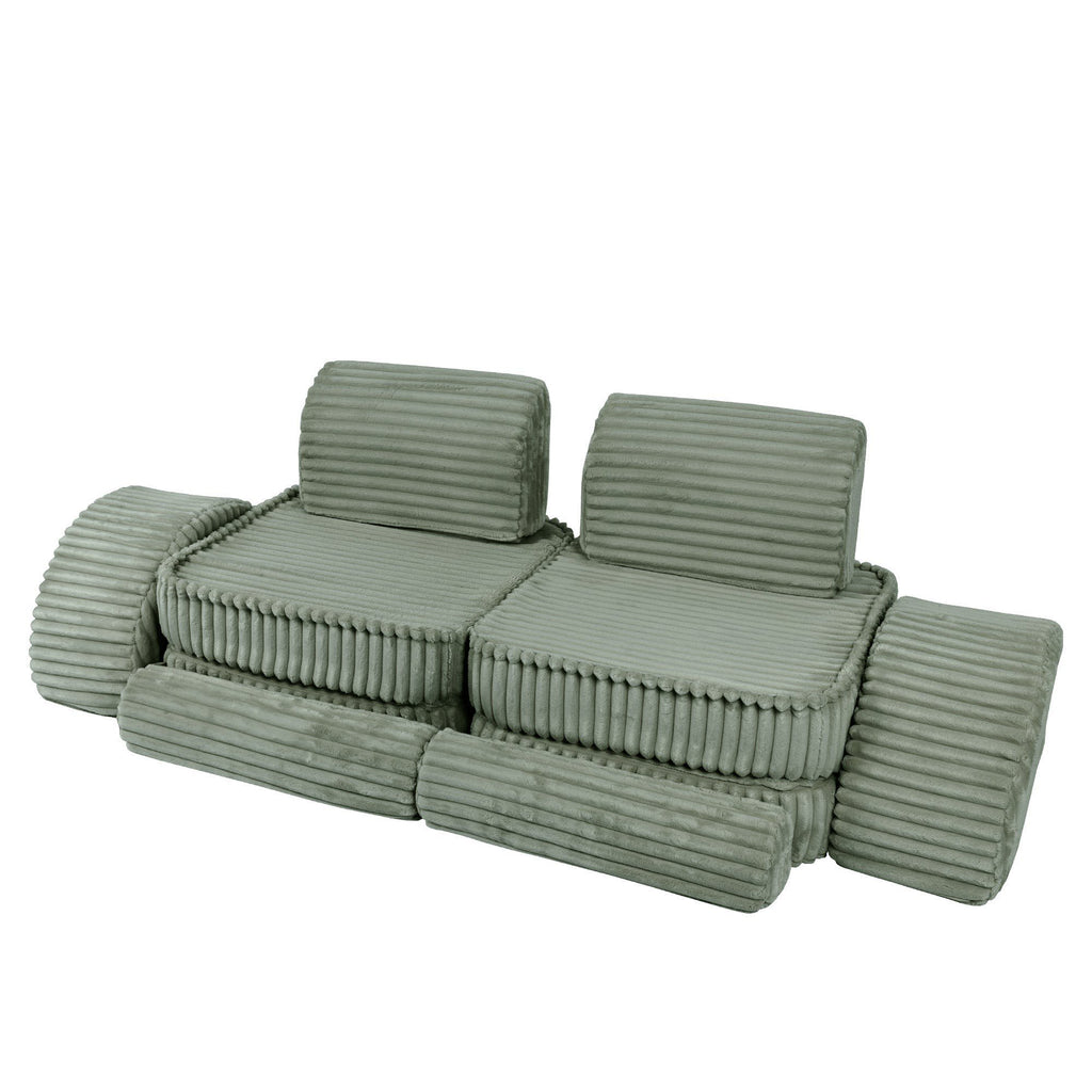 2. Medium modular kids sofa in sage green corduroy with ribbed texture, featuring two seats and circular cushions, shown in a compact configuration.