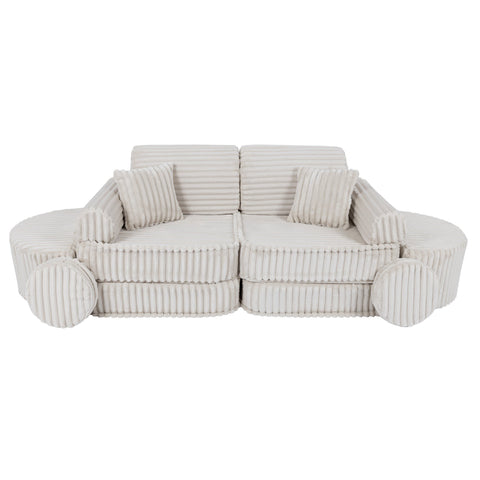 5. Medium kids sofa in churros white with ribbed corduroy fabric, featuring two seats and multiple cushions, arranged in a compact configuration.