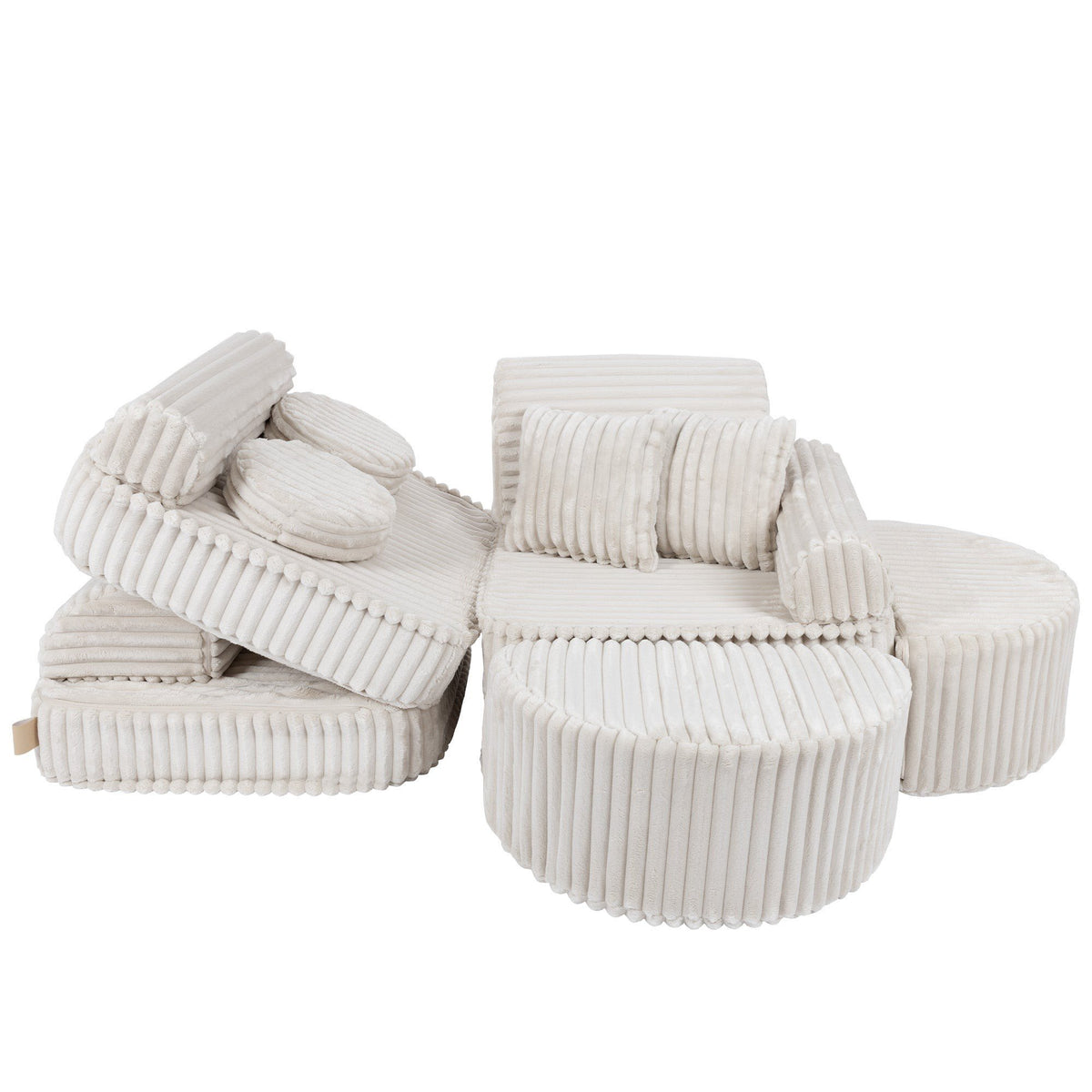 12. Medium kids sofa in churros white with ribbed corduroy fabric, featuring multiple cushions, arranged in a playful configuration.